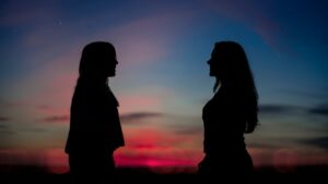 women silhouette sunset